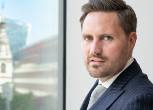 Oliver_Chapman_CEO_OCI_Group_Office_Window