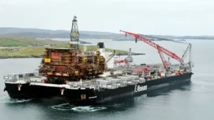 World’s Largest Heavy Lift Vessel Removes 17,200-Ton Platform from North Sea, 42 Years After First Oil Production, Heading for Dismantling in Shetland
